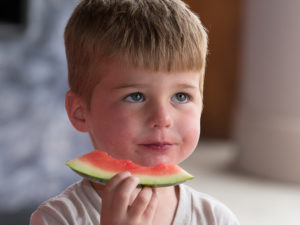 Family Fun Eating Watermelon | Yogi Bear's Jellystone Park™ Camp-Resort | South Haven, MI