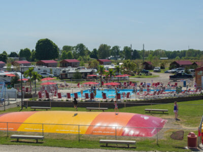 Kids jumping and playing on jumping pillow at Jellystone Park™ South Haven