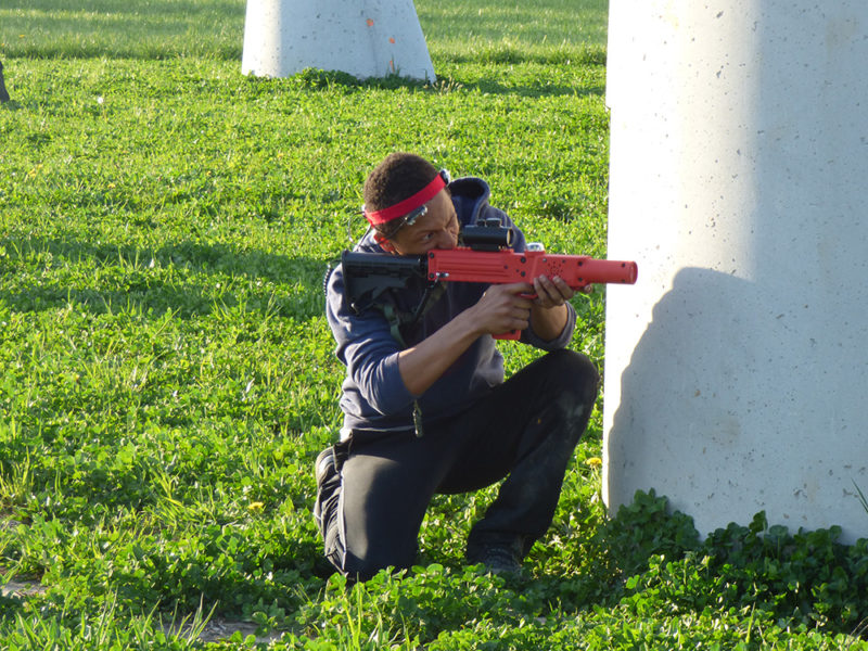 Kids playing laser tag at South Haven Jellystone Park™ campground